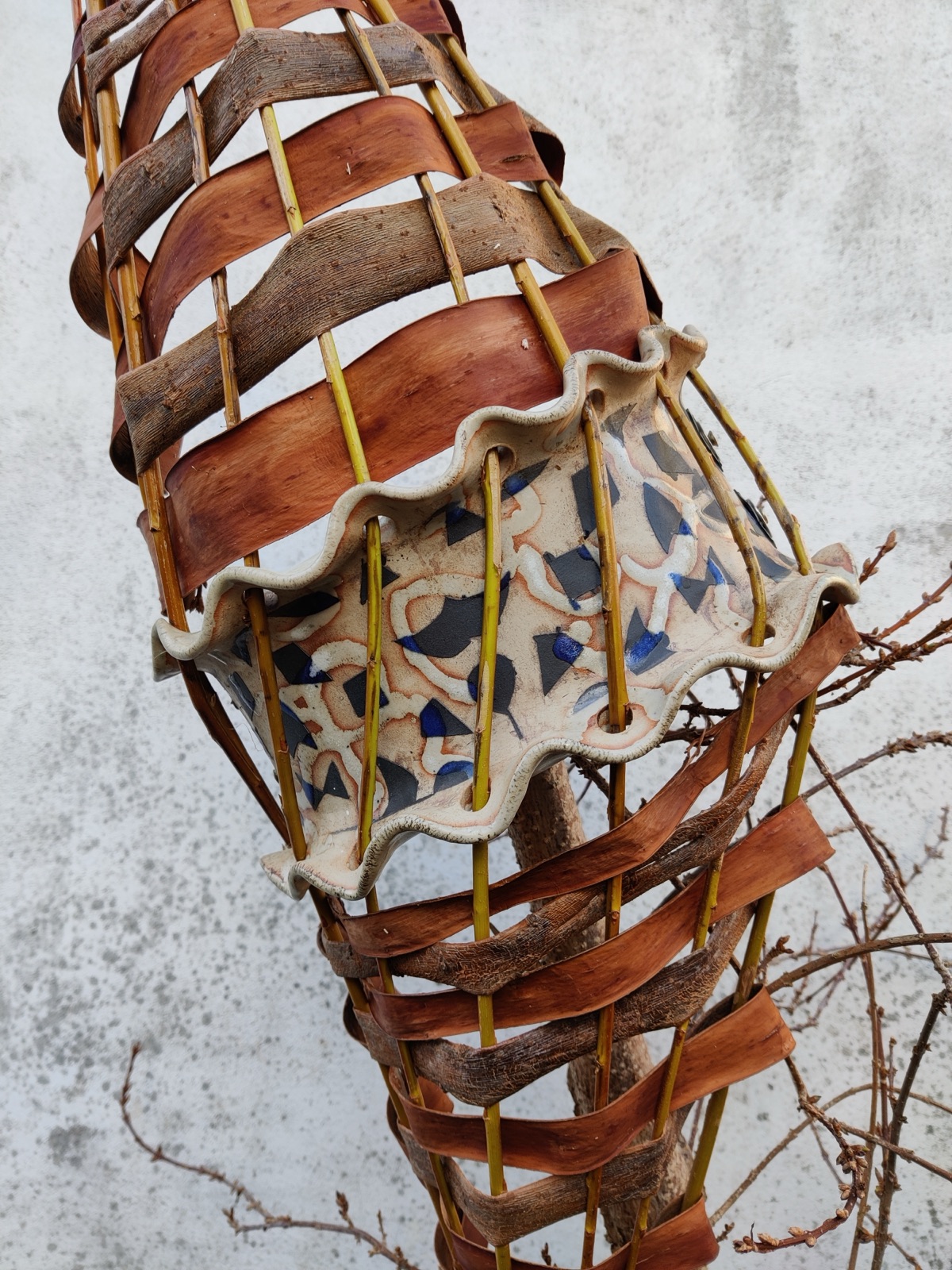 Willow, bark and slip-decorated ceramic light piece, detail